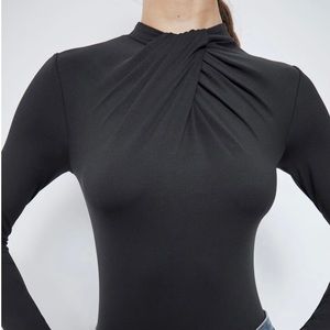 Knotted stretch body suit